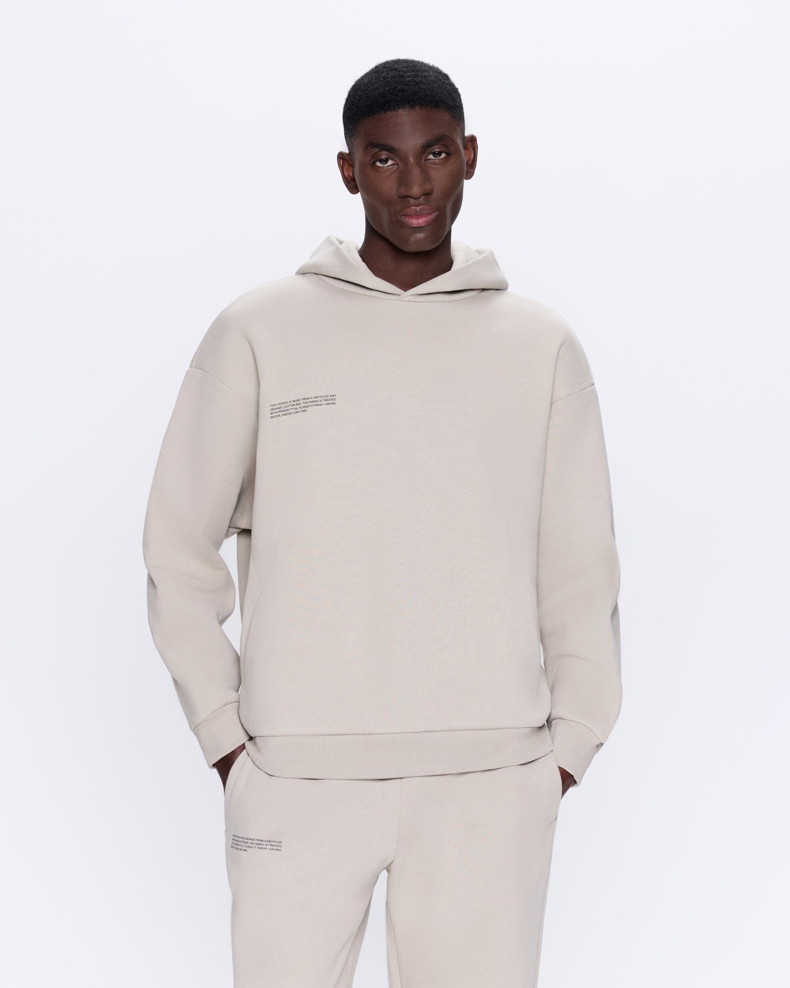 365_HEAVYWEIGHT_HOODIE_STONE_MENS_FRONT-MODEL