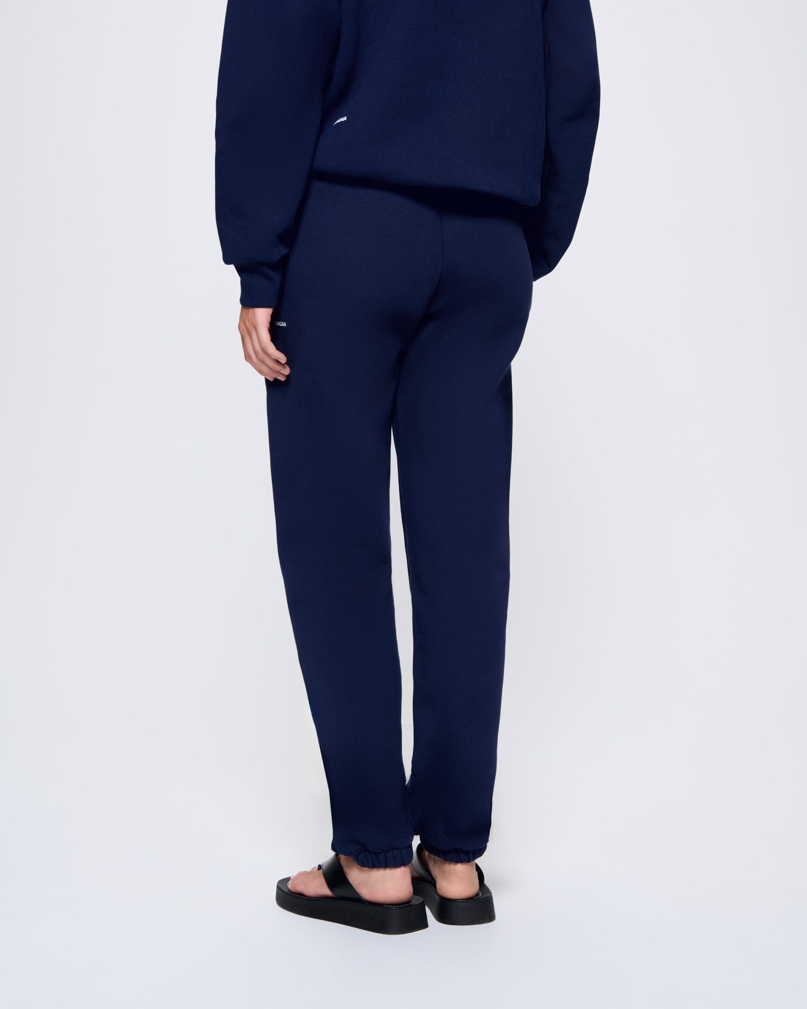 365_HEAVYWEIGHT_TRACK-PANTS_NAVY-BLUE_WOMENS_BACK-MODEL