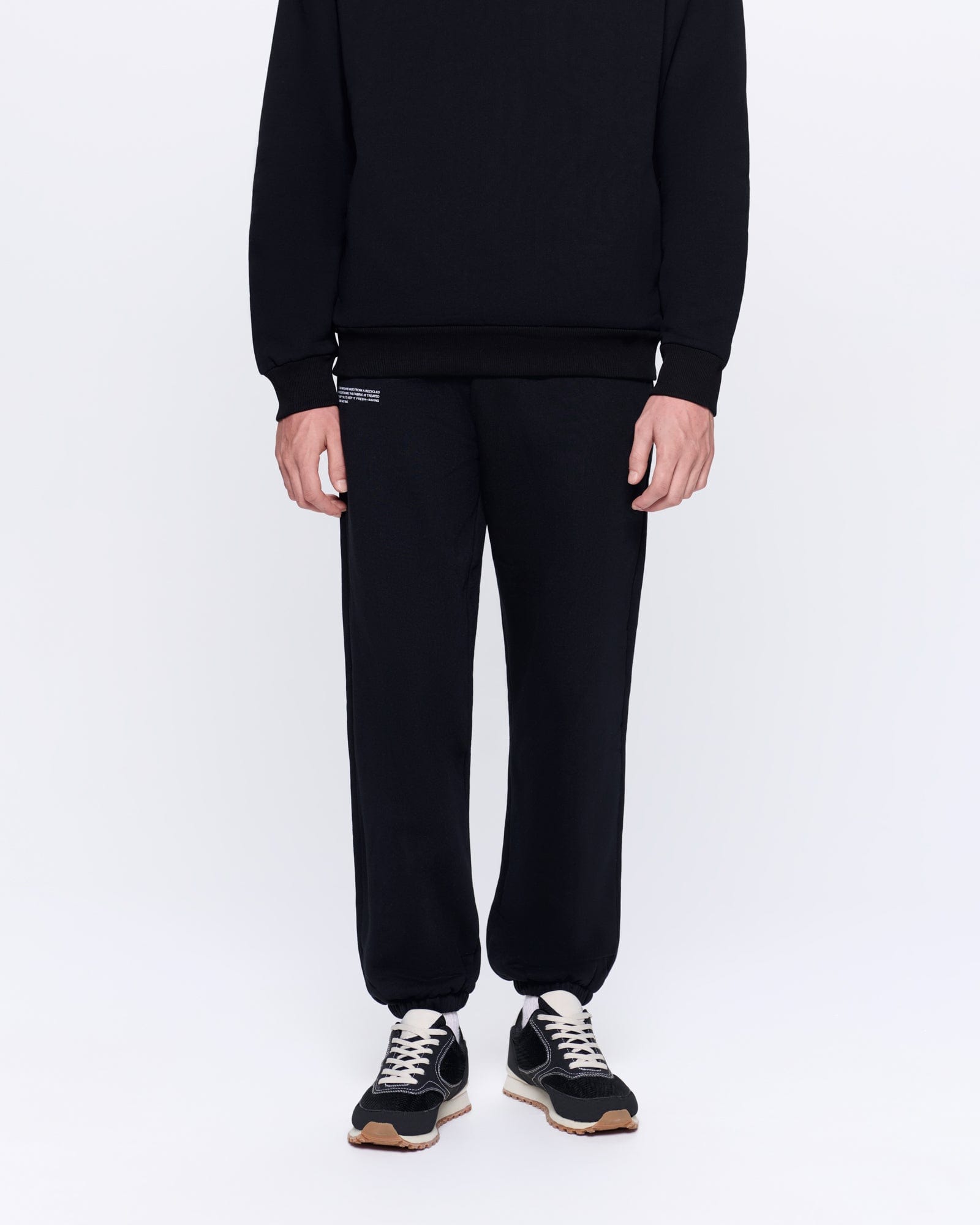 365_HEAVYWEIGHT_TRACK_PANTS_BLACK_MENS_FRONT-MODEL