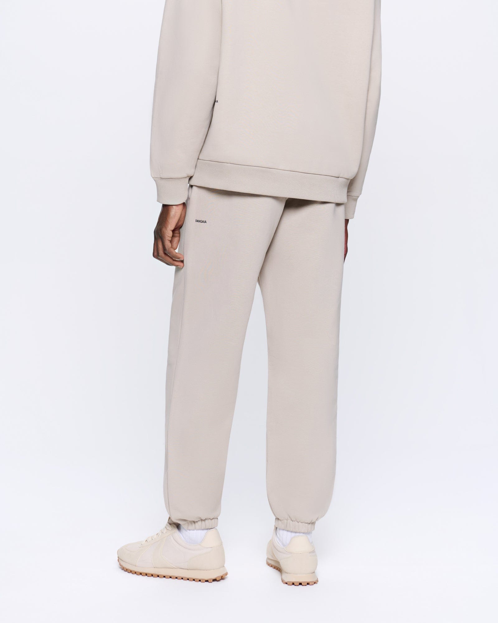 365_HEAVYWEIGHT_TRACK_PANTS_STONE_MENS_BACK-MODEL