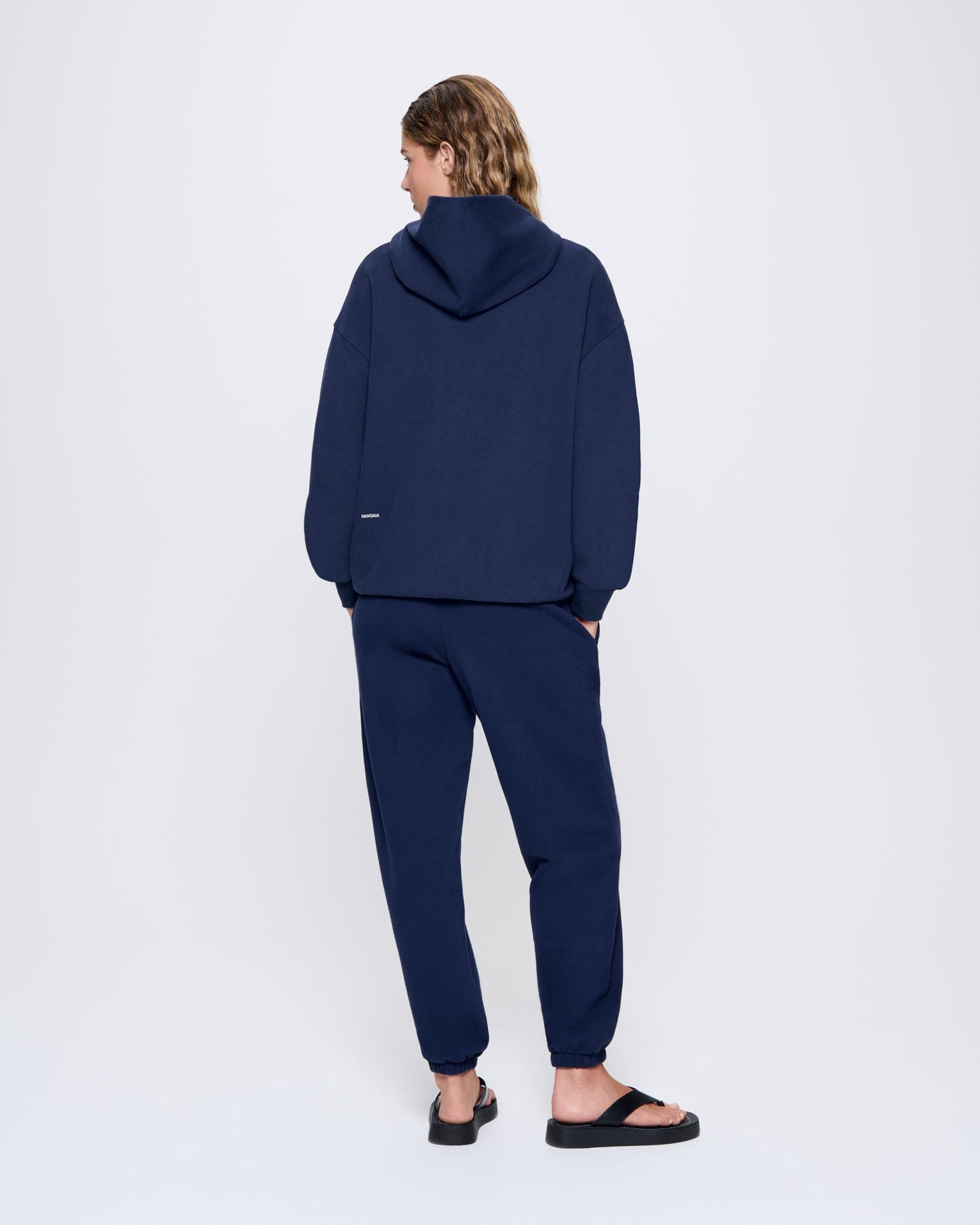365_MIDWEIGHT_HOODIE_NAVY-BLUE_WOMENS_BACK-MODEL