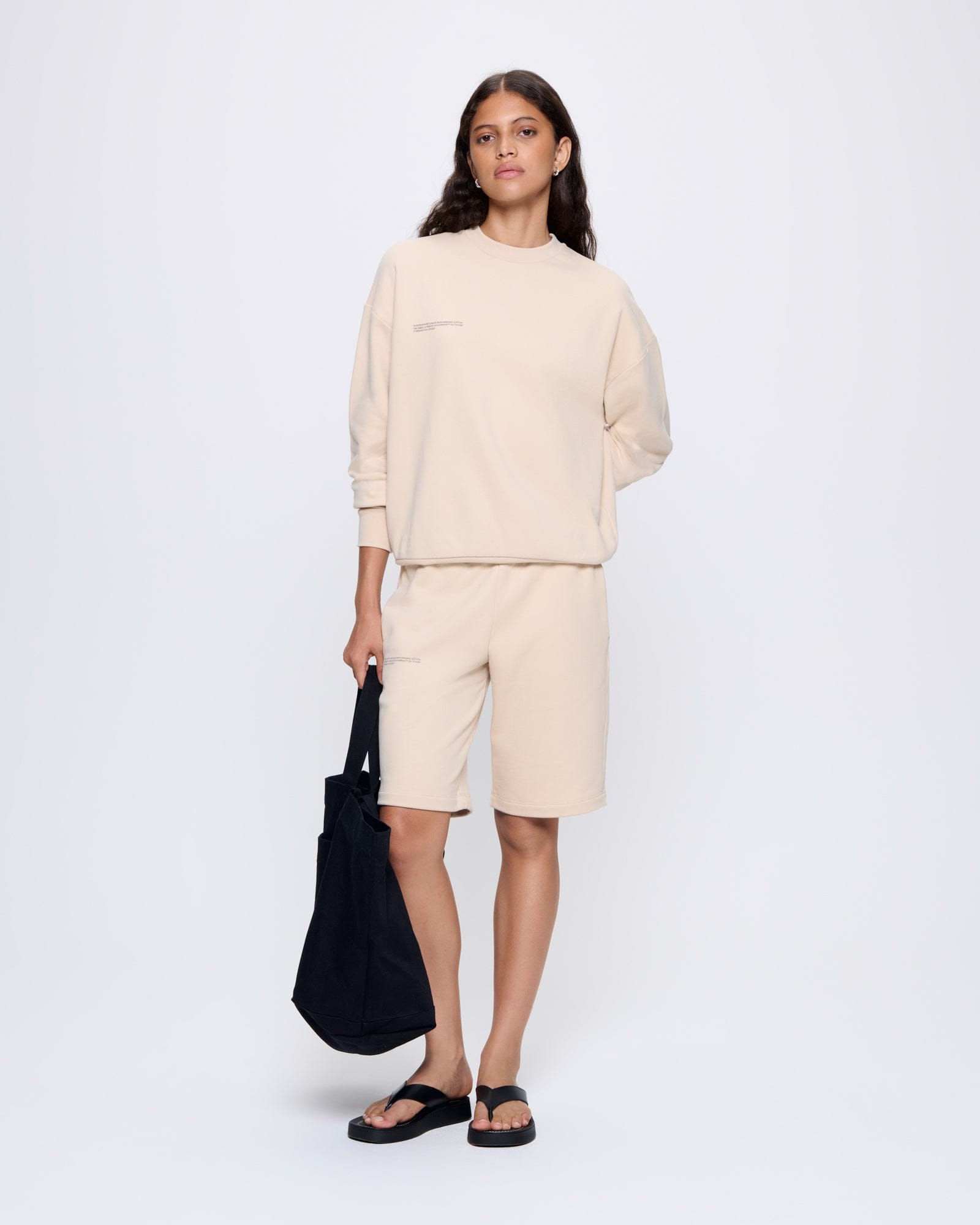 365_MIDWEIGHT_LONG-SHORTS_SAND_WOMENS_LEAD-MODEL