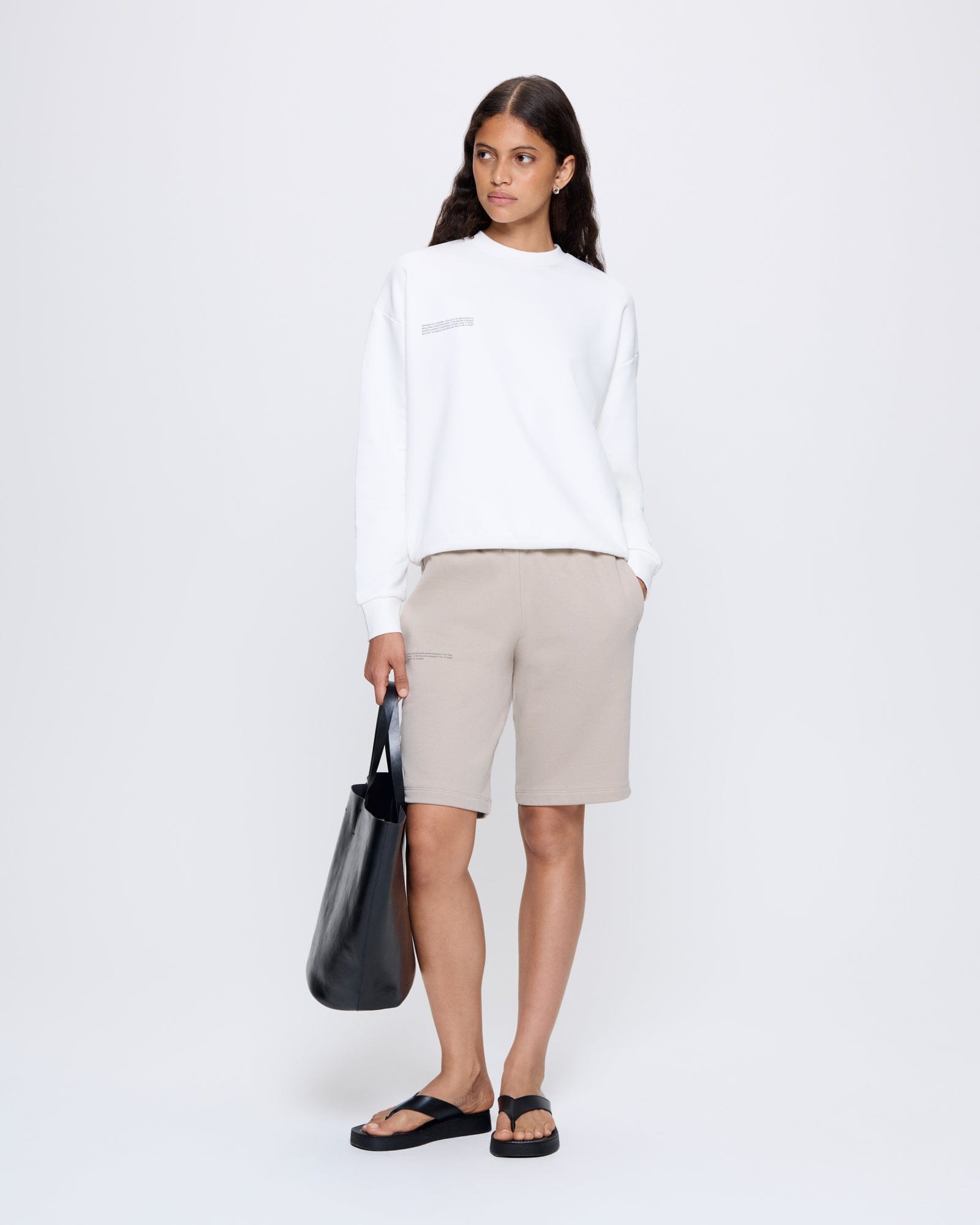 365_MIDWEIGHT_LONG-SHORTS_STONE_WOMENS_LEAD-MODEL