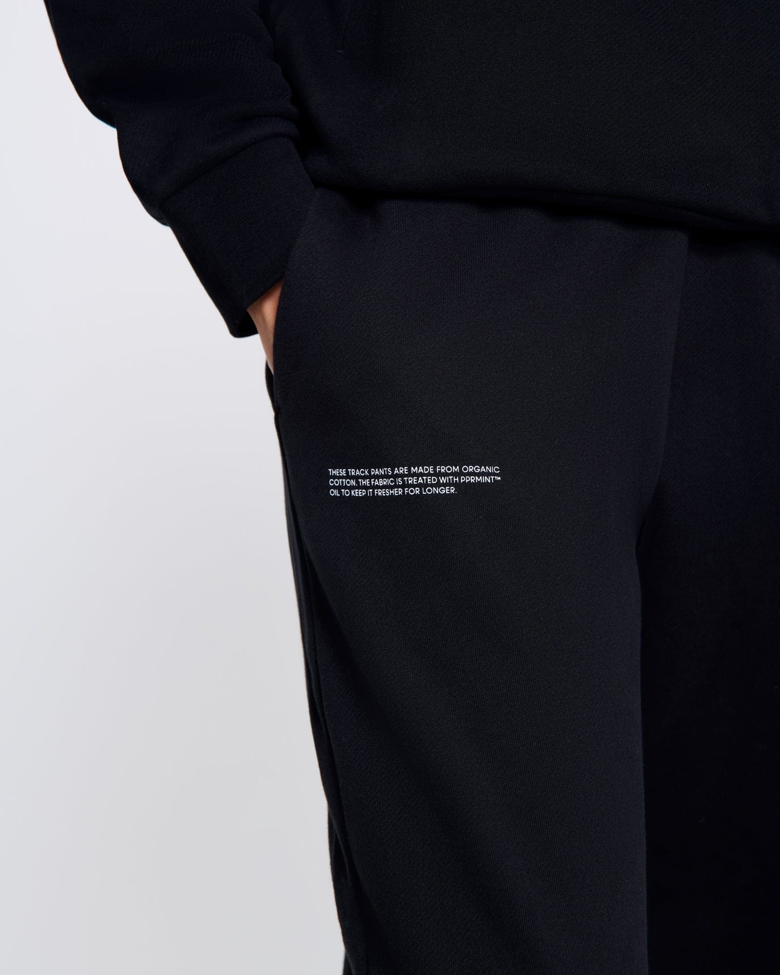 365_MIDWEIGHT_TRACK-PANTS_BLACK_WOMENS_DETAIL-MODEL