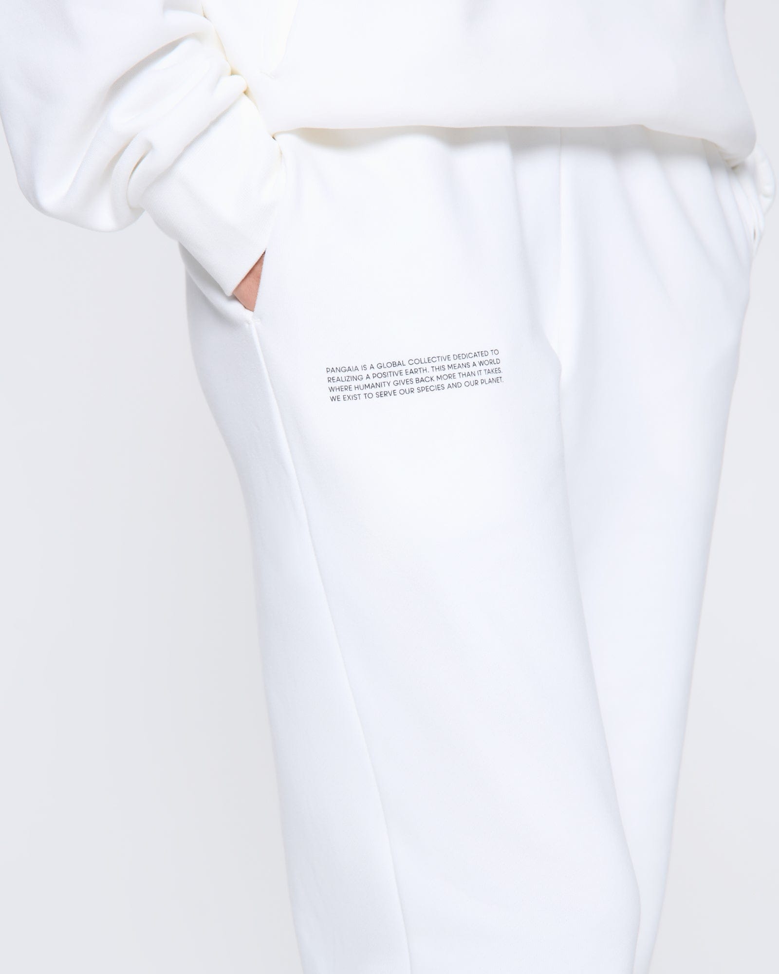 365_MIDWEIGHT_TRACK-PANTS_OFF-WHITE_WOMENS_DETAIL-MODEL