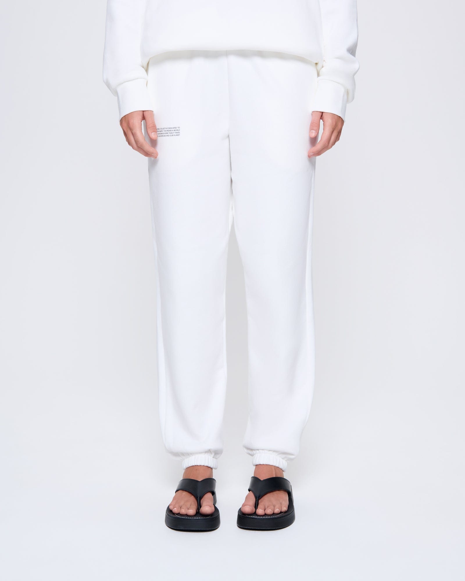 365_MIDWEIGHT_TRACK-PANTS_OFF-WHITE_WOMENS_FRONT-MODEL