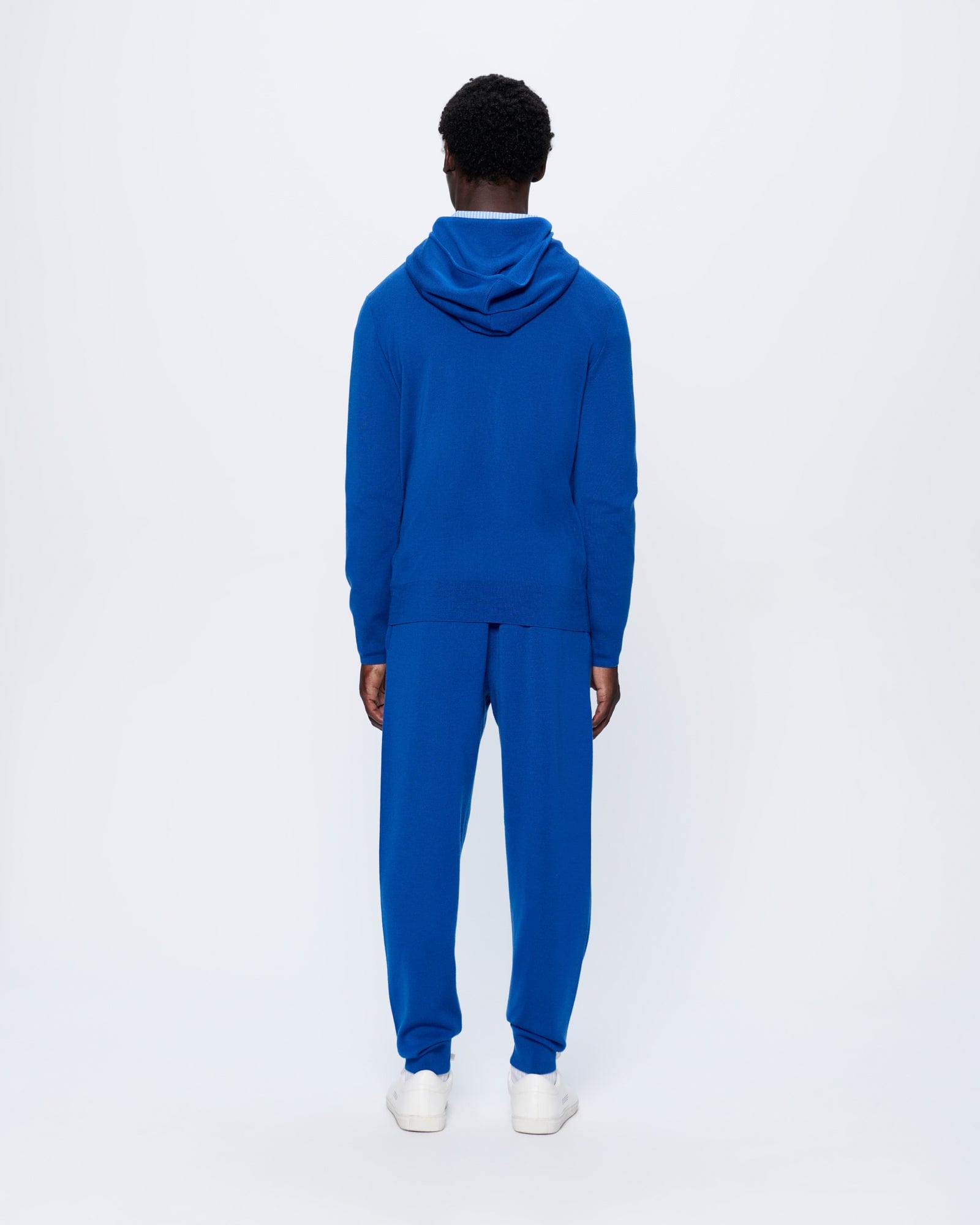 DNA_REGENERATIVE_MERINO_WOOL_TRACK_PANTS_EARTH_BLUE_MENS_BACK