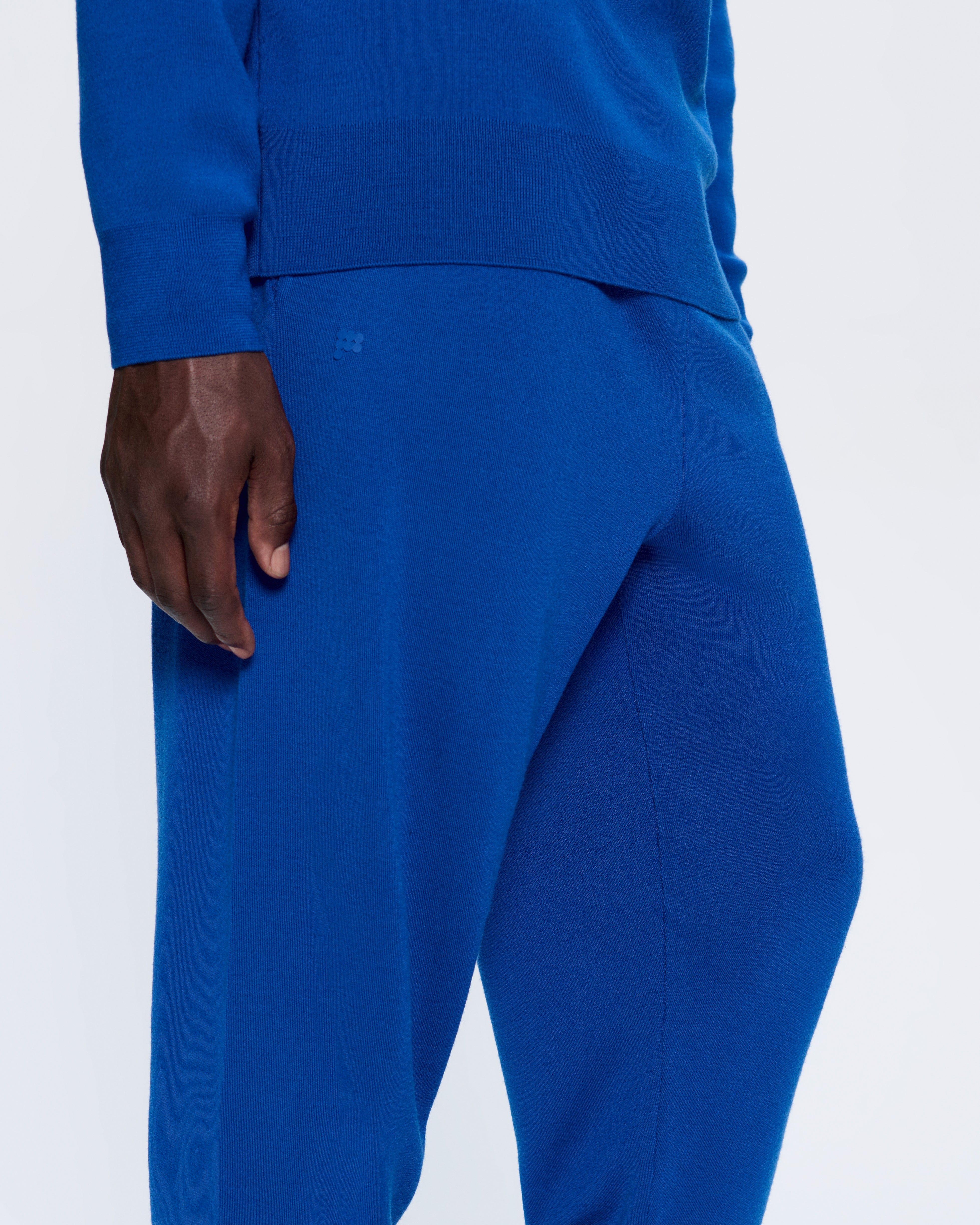 DNA_REGENERATIVE_MERINO_WOOL_TRACK_PANTS_EARTH_BLUE_MENS_DETAIL