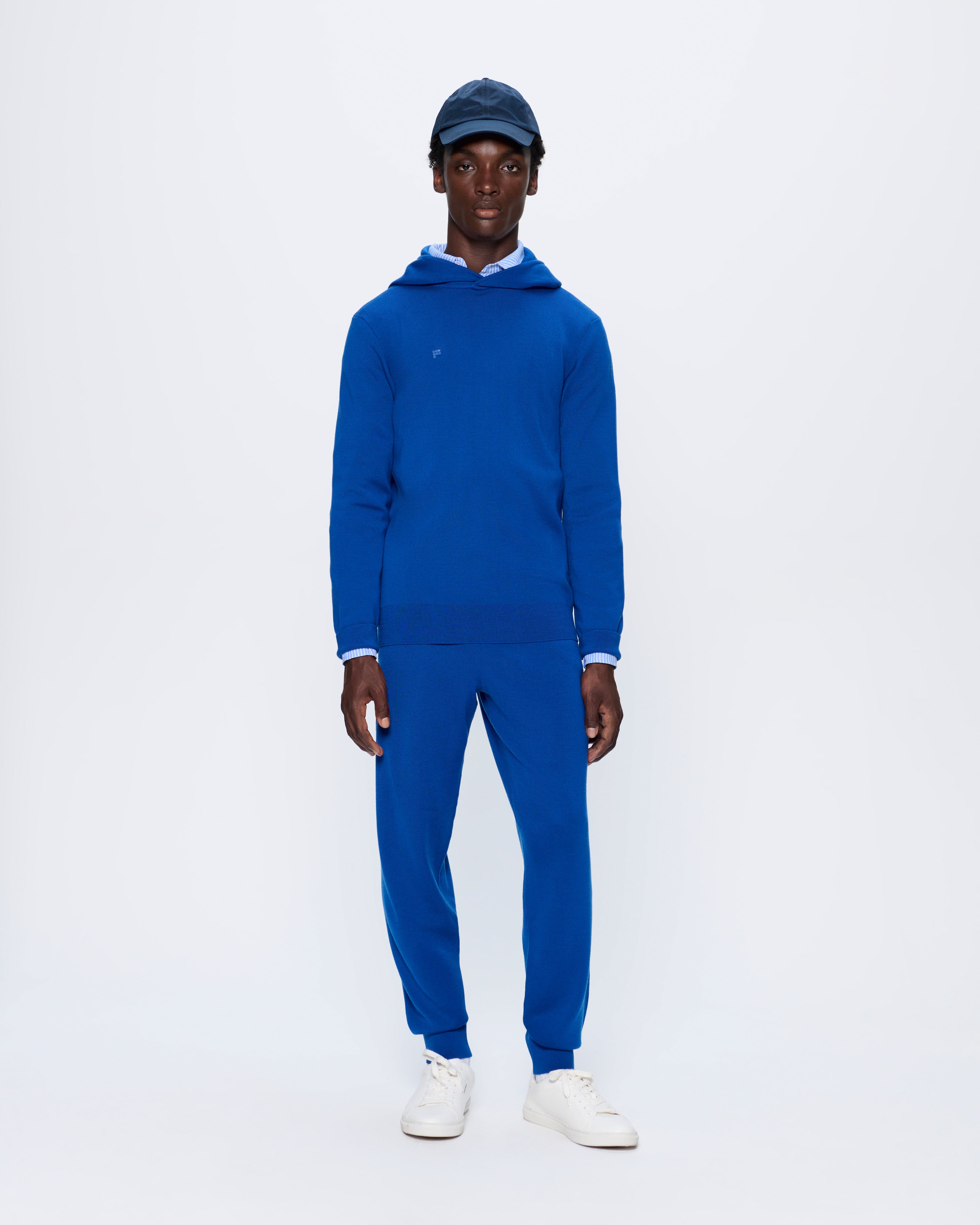 DNA_REGENERATIVE_MERINO_WOOL_TRACK_PANTS_EARTH_BLUE_MENS_LEAD