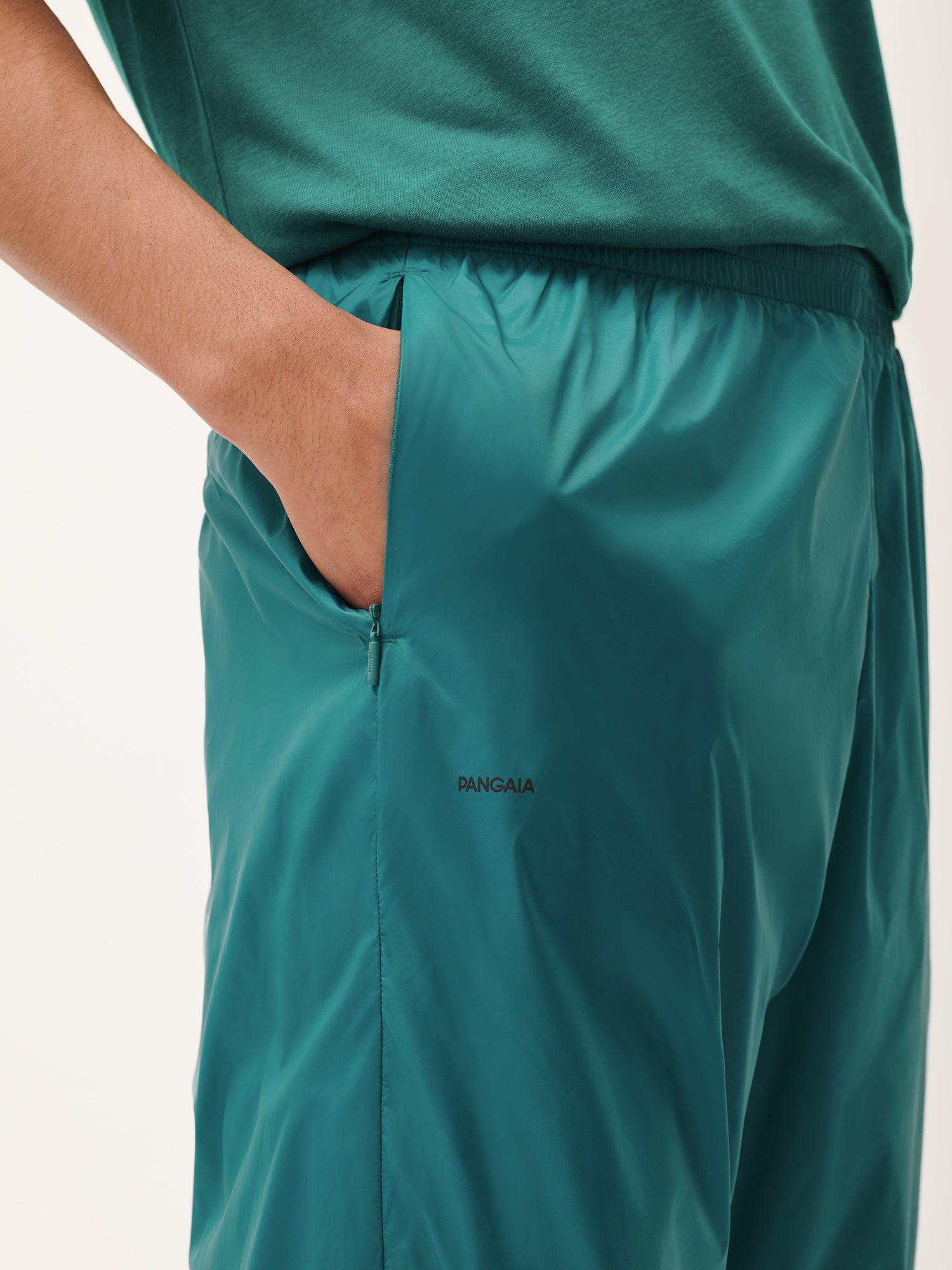 DNA_Recycled_Nylon_Track_Pants_Scarab_Teal_Male