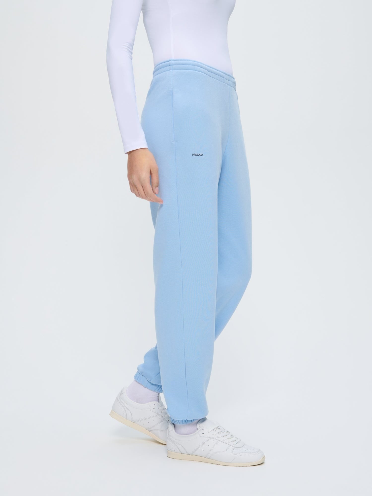 Womens Dewdrop Blue 365 Midweight Track Pants. Loose fit, 100% organic cotton sweatpants with elasticated cuffs, Pangaia logo