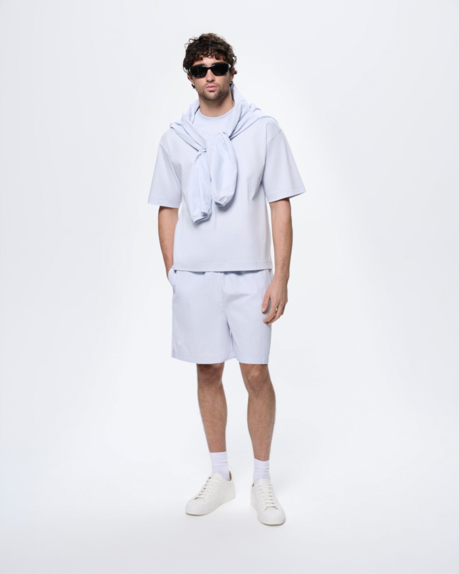 Mens Interlock Oversized T-Shirt, Ice Grey, on model. Ultra-soft organic cotton, relaxed fit, crew neck collar