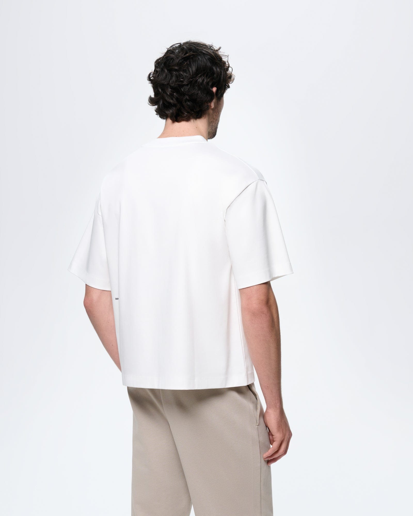 Mens Off-White Interlock jersey oversized T-shirt, 100% organic cotton. Relaxed fit, crew neck, on model from back