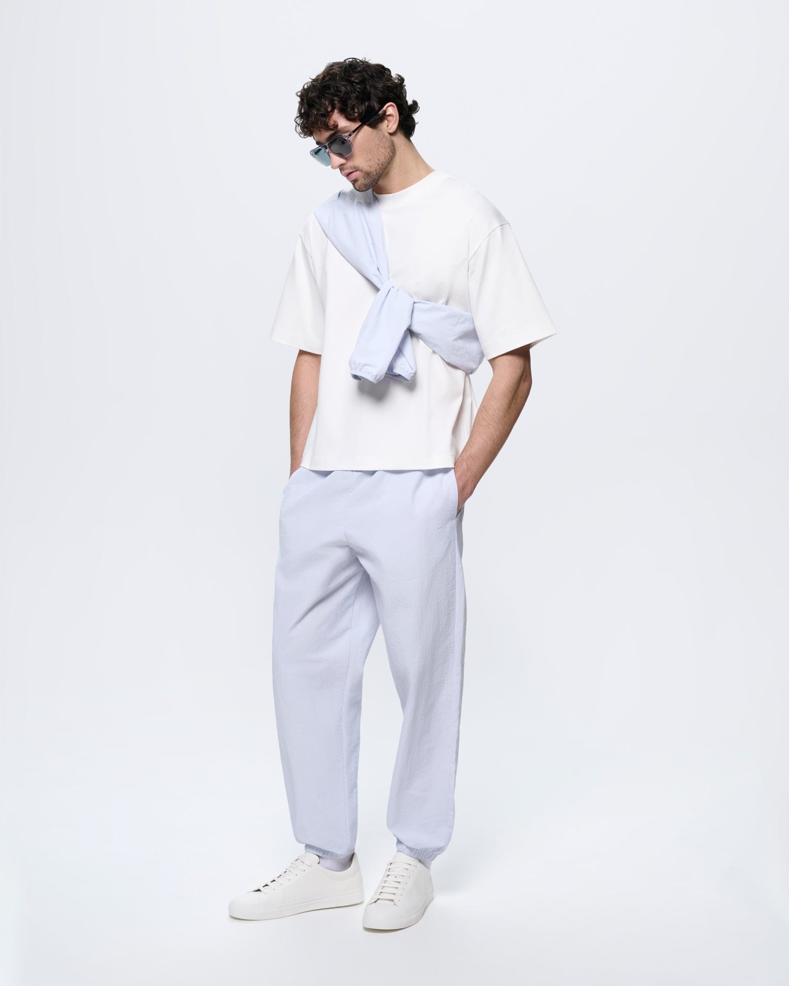 Mens Ice Grey Recycled Nylon Track Pants. Oversized, lightweight 100% recycled polyamide joggers