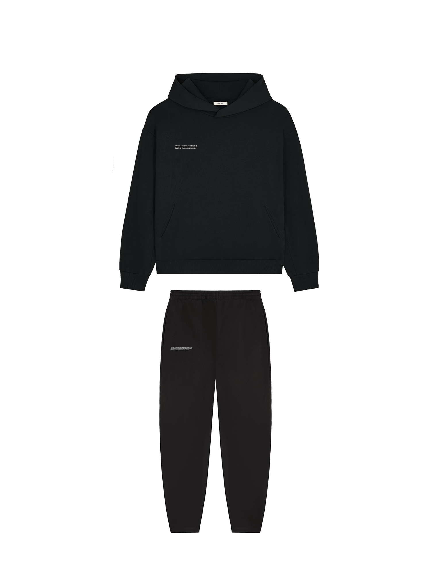 Black premium loungewear packshot. Oversized cotton blend pullover hoodie with kangaroo pocket and matching relaxed fit joggers