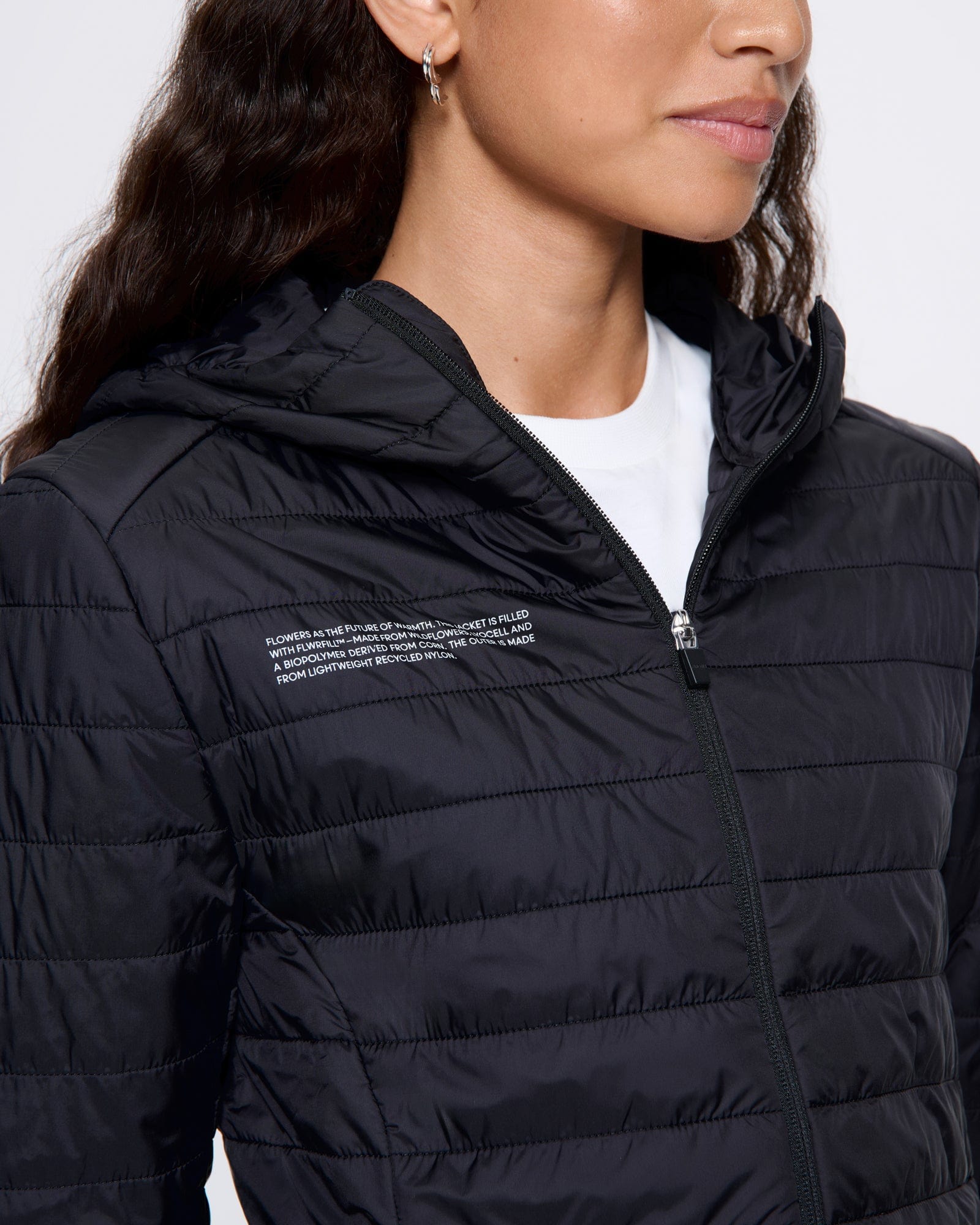 WOMENS_FLOWER-WARMTH_LITE_JACKET_BLACK_WOMENS_DETAIL