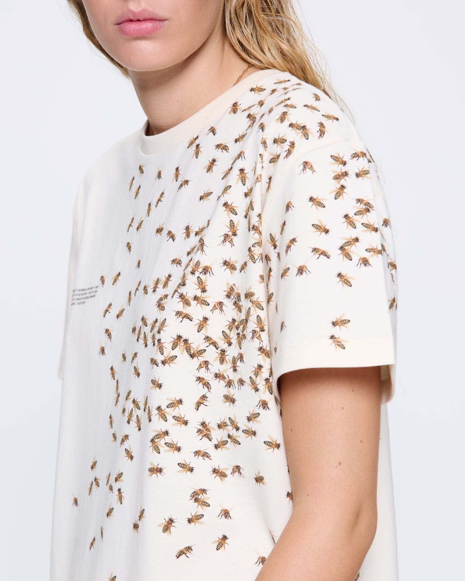 Womens Archive Bee:Wild Undyed Organic Cotton T-shirt, oversized, unique bee print. Model wears cream 170 GSM