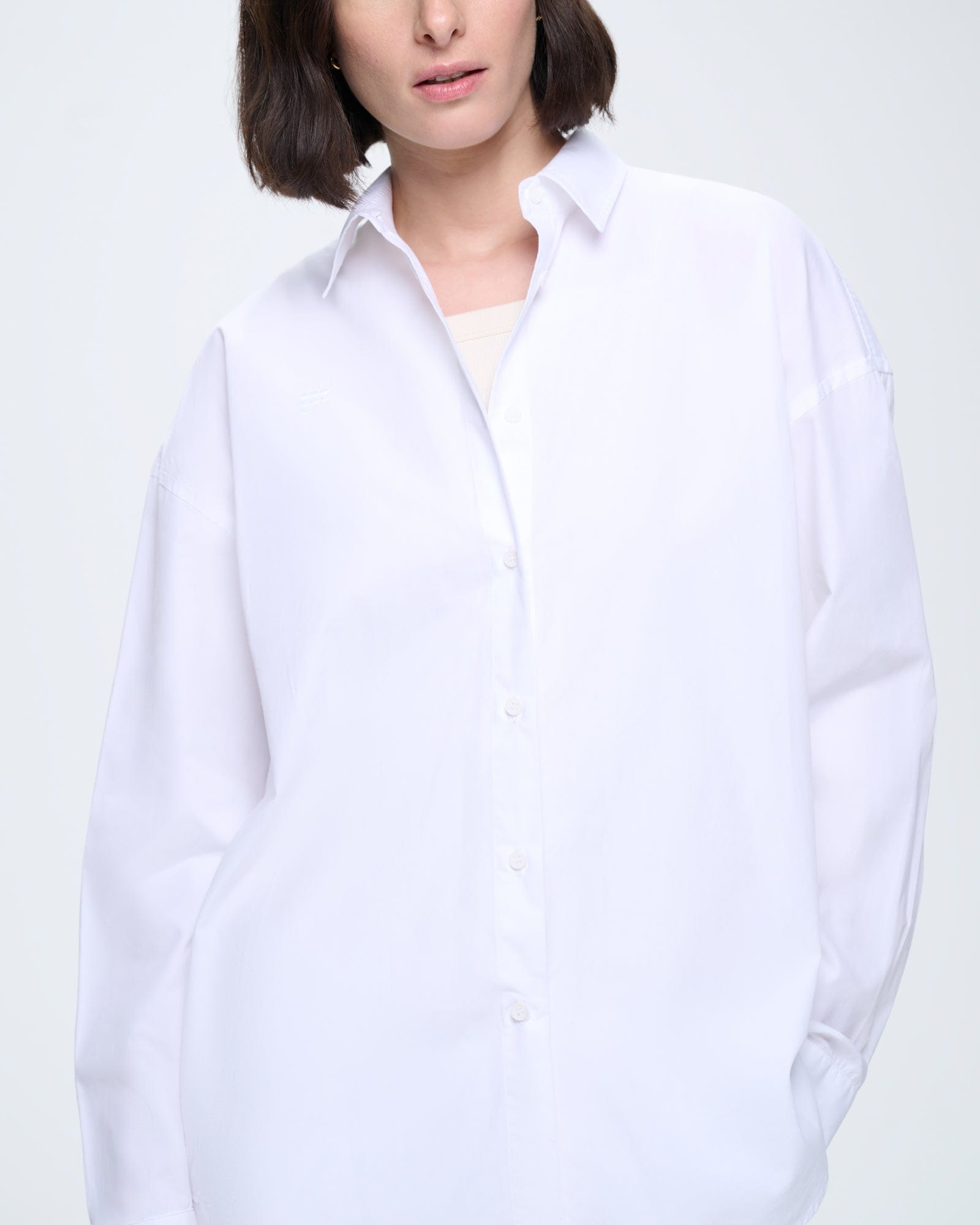 Off-White womens oversized cotton poplin overshirt with button-front, collar, and tonal logo