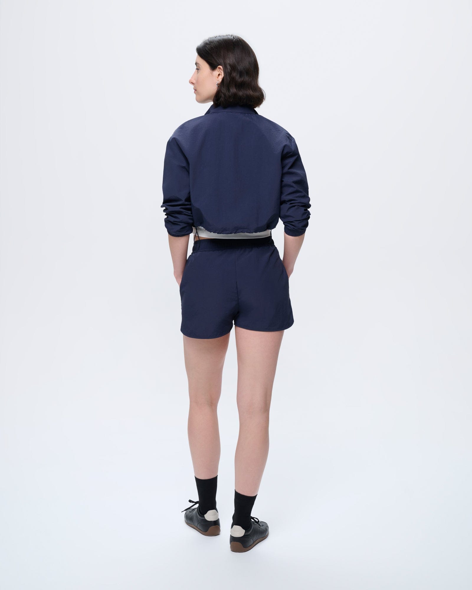Womens Recycled Nylon Zip Up Jacket, Granite Navy, cropped fit, lightweight 100% recycled polyamide on model from behind