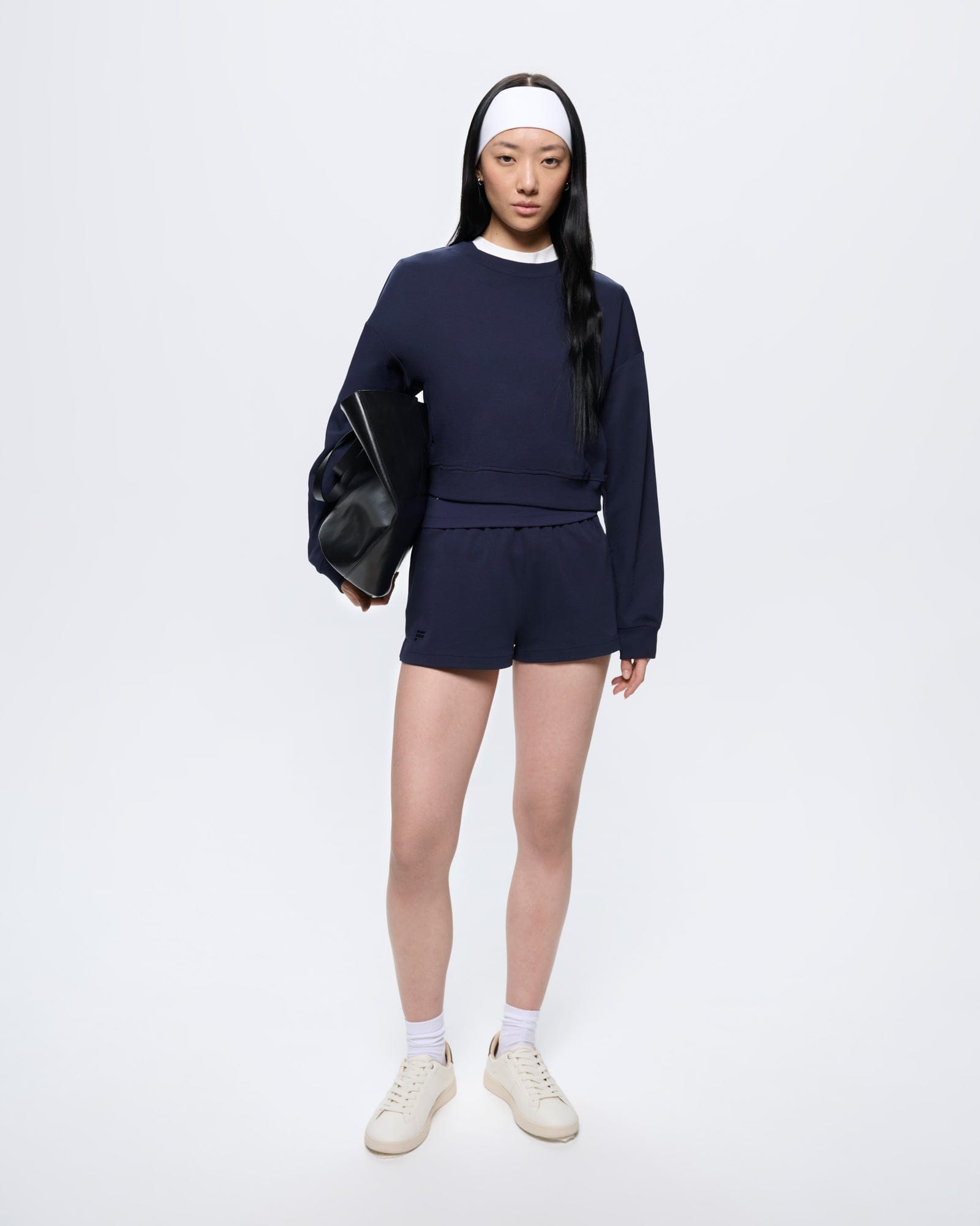 Womens Cropped Sweatshirt Midnight Navy, 100% organic cotton, structured crew neck, long sleeve, ribbed cuffs and hem, worn by model
