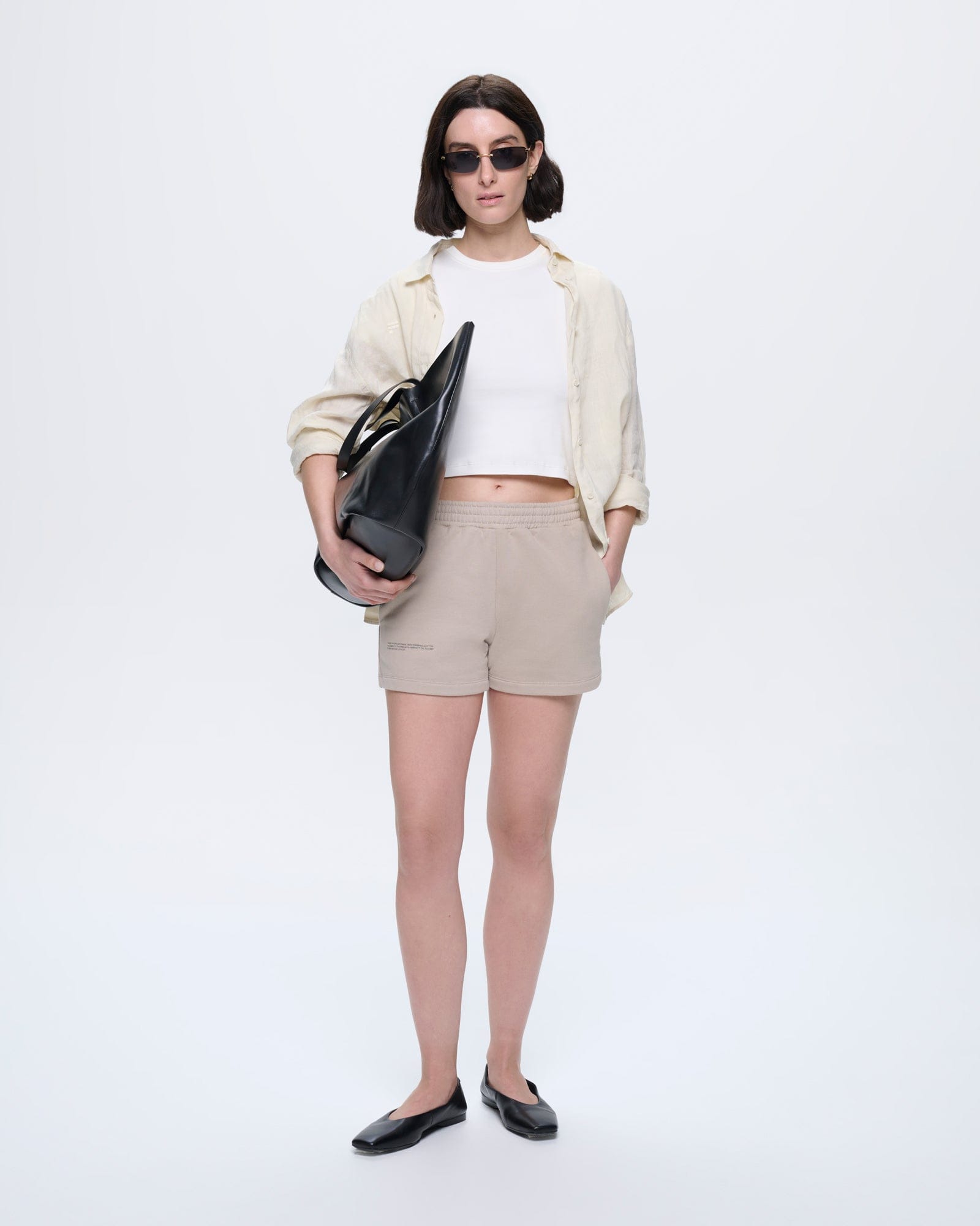 Off-white womens cropped t-shirt, 100% organic cotton, crew neck, short sleeves, slim fit, structured silhouette, ultra-soft