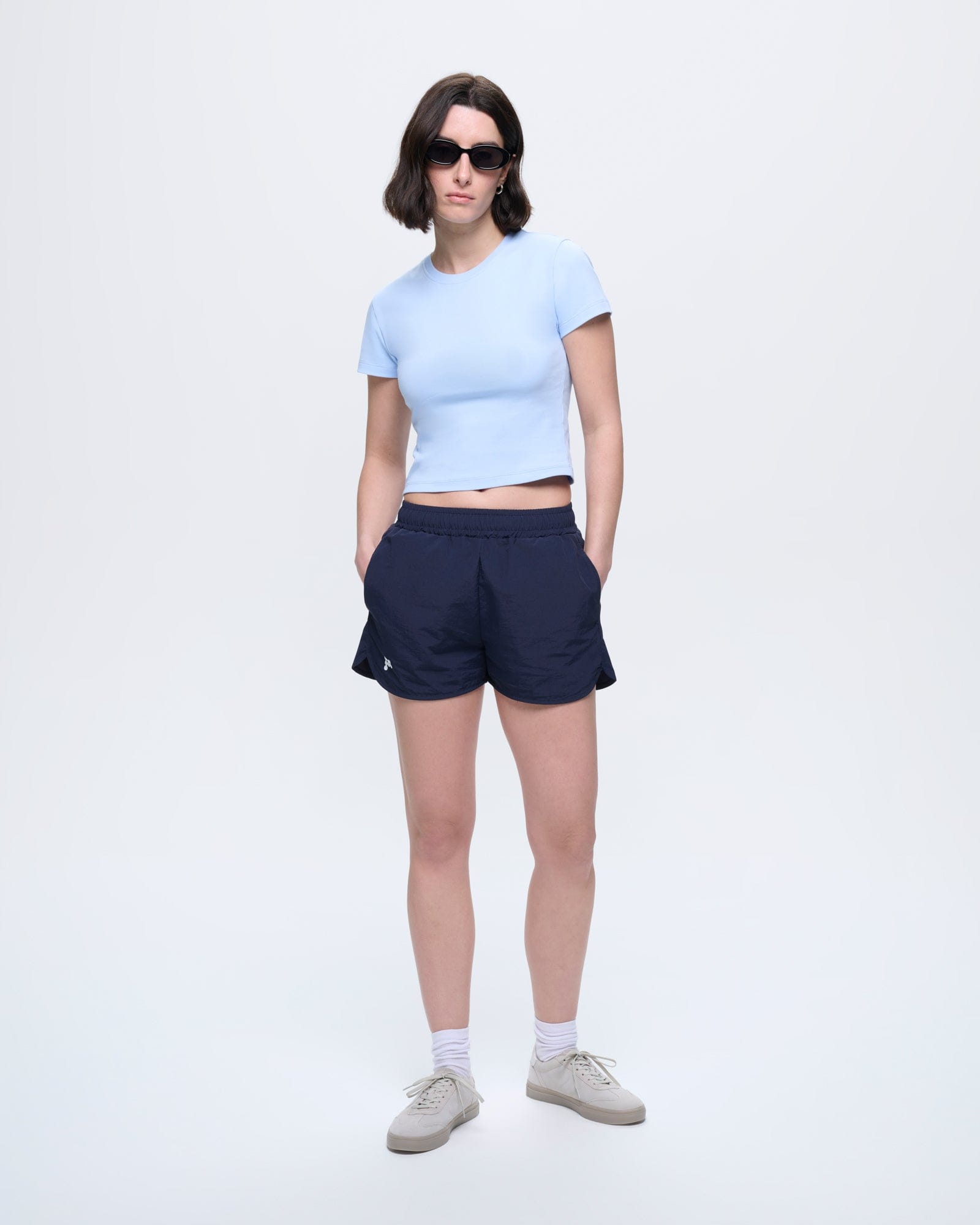 Womens Cropped T-Shirt Wildflower Blue. Slim fit organic cotton, crew neck, short sleeve tee on model
