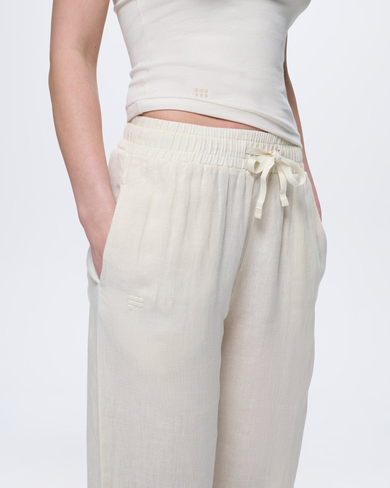 Womens Bone White European Flax linen trousers. Relaxed fit, elasticated drawstring waist, side pockets. Ultra-soft, lightweight feel