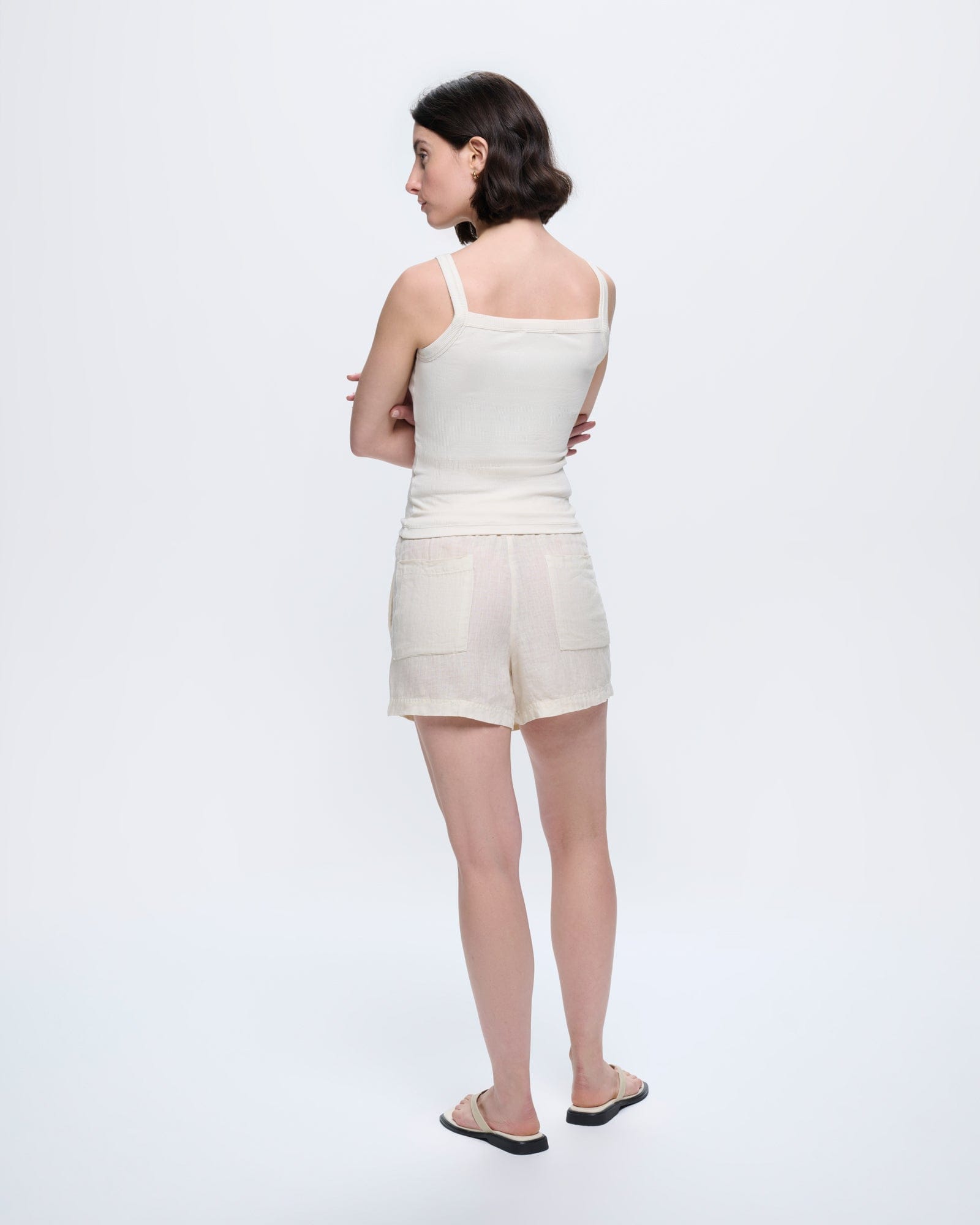 Womens Bone White European Flax linen wrap shorts, relaxed fit, ultra-soft texture, on model from back