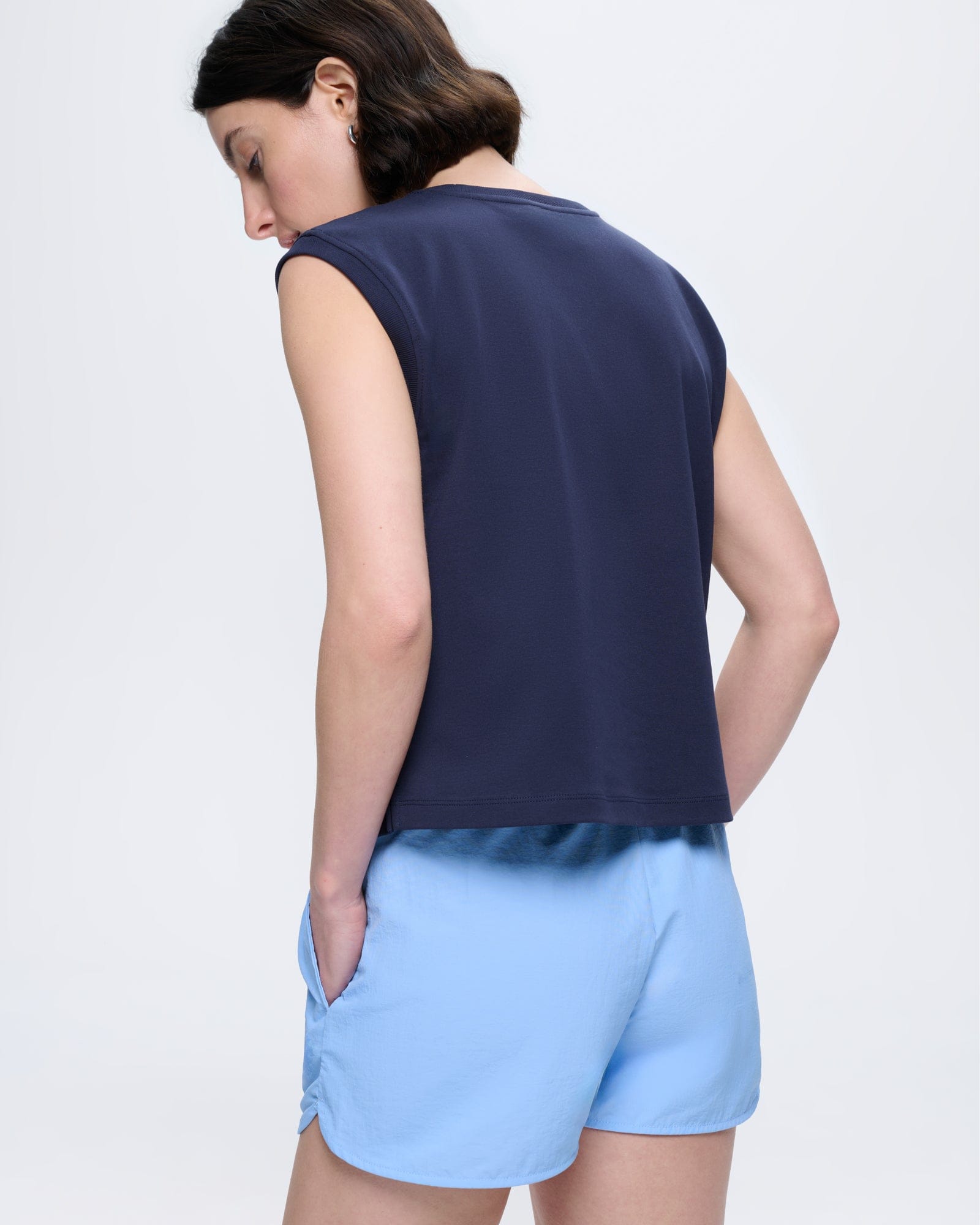 Womens Midnight Navy sleeveless organic cotton T-shirt. Relaxed fit, ultra-soft feel, crew neck