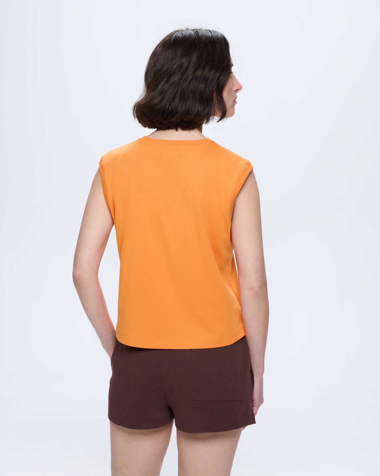 Womens Saffron Orange Sleeveless T-Shirt, 100% organic cotton, relaxed fit, crew neck, model back view